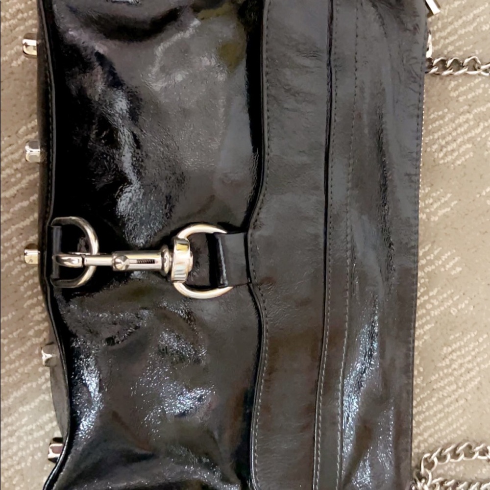 Patent leather cross body with silver hardware. Brand new condition
